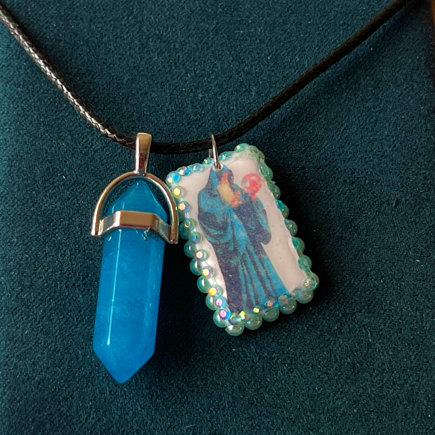 Handmade wizard charm necklace — one-of-a-kind clay mystical orb wizard charm bedazzled with iridescent pearls and paired with luminous blue gem pendant on 22" vegan leather chain with silver-tone hardware. Charm approx. 1". Ready to ship.