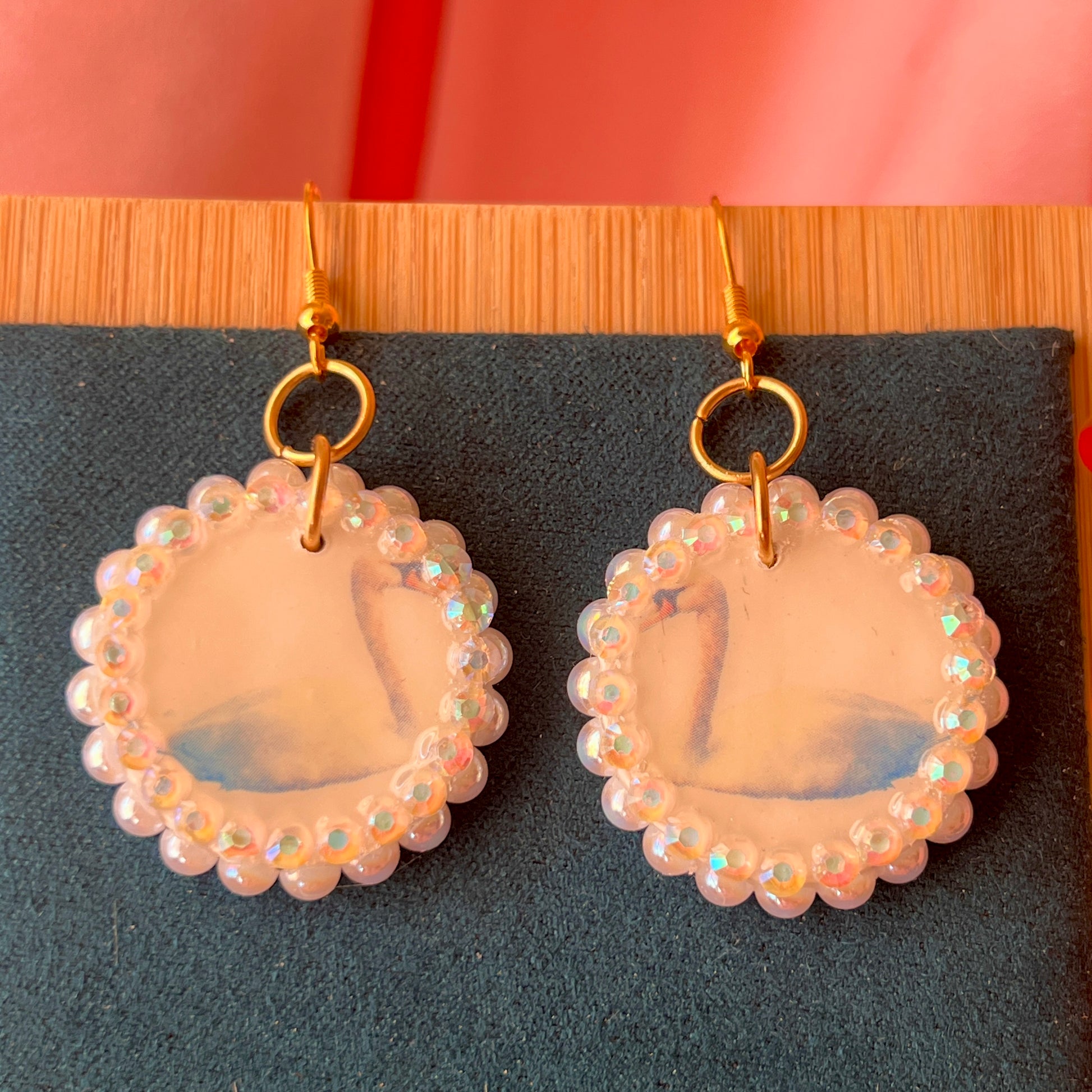 Alt text: “Iridescent swan charm earrings—handmade polymer clay swan dangle earrings bedazzled with iridescent beads, featuring 18k gold plated hypoallergenic hooks—perfect fairycore, coquette, cottagecore, whimsigoth, and Y2K style.”
