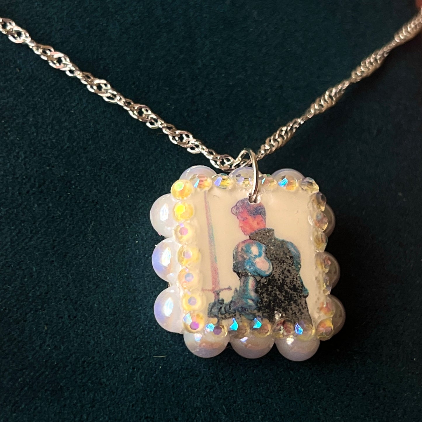 Iridescent knight & sword necklace — handmade polymer clay knight + sword charms bedazzled with iridescent beads on 20" 925 silver chain. Gift-ready green Victorian-patterned box. Fairycore coquette cottagecore Y2K charm necklace; ready to ship in 1–3 business days.