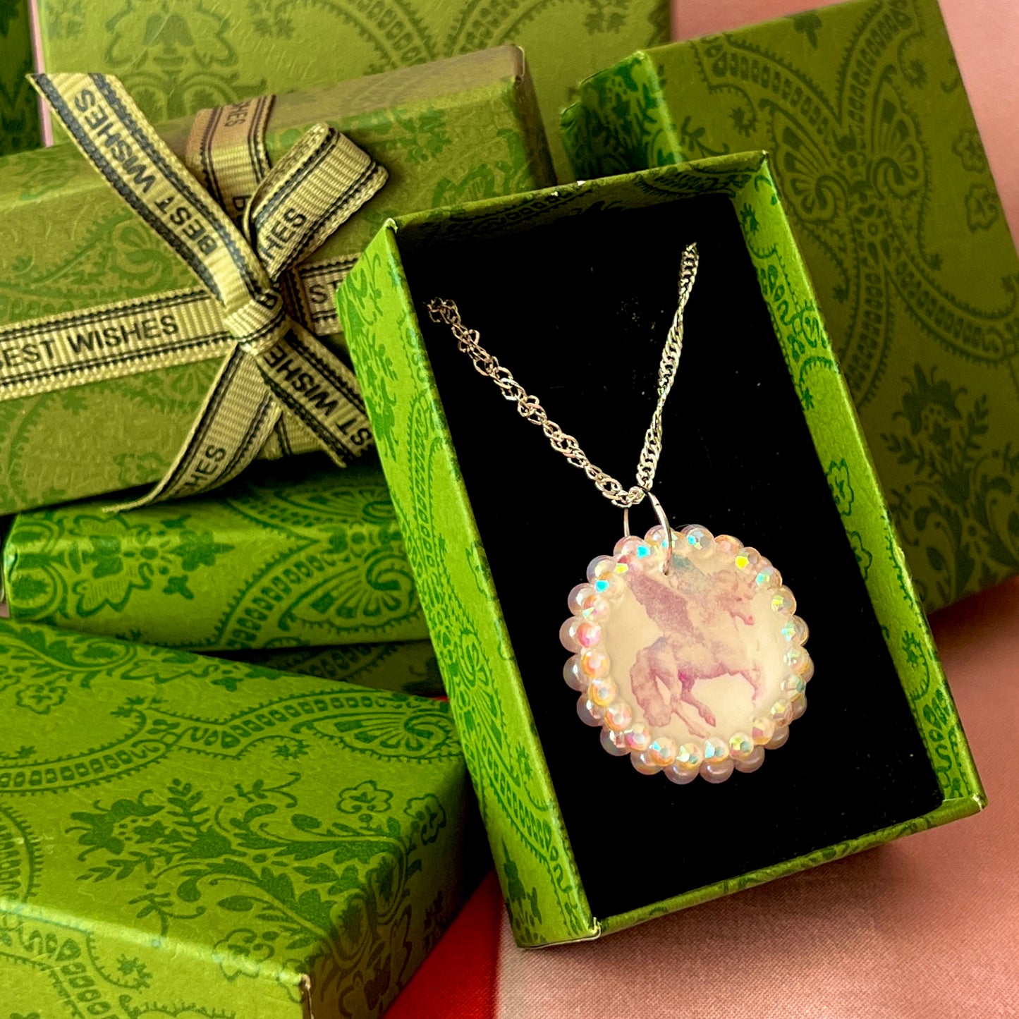Pegasus pearl charm necklace — coquette fantasy jewelry with handmade pegasus charm bedazzled with pastel pearls on 20" 925 sterling silver chain. Ships gift-ready in green Victorian-patterned box; ready to ship. Medieval magic talisman necklace by Olive Made.