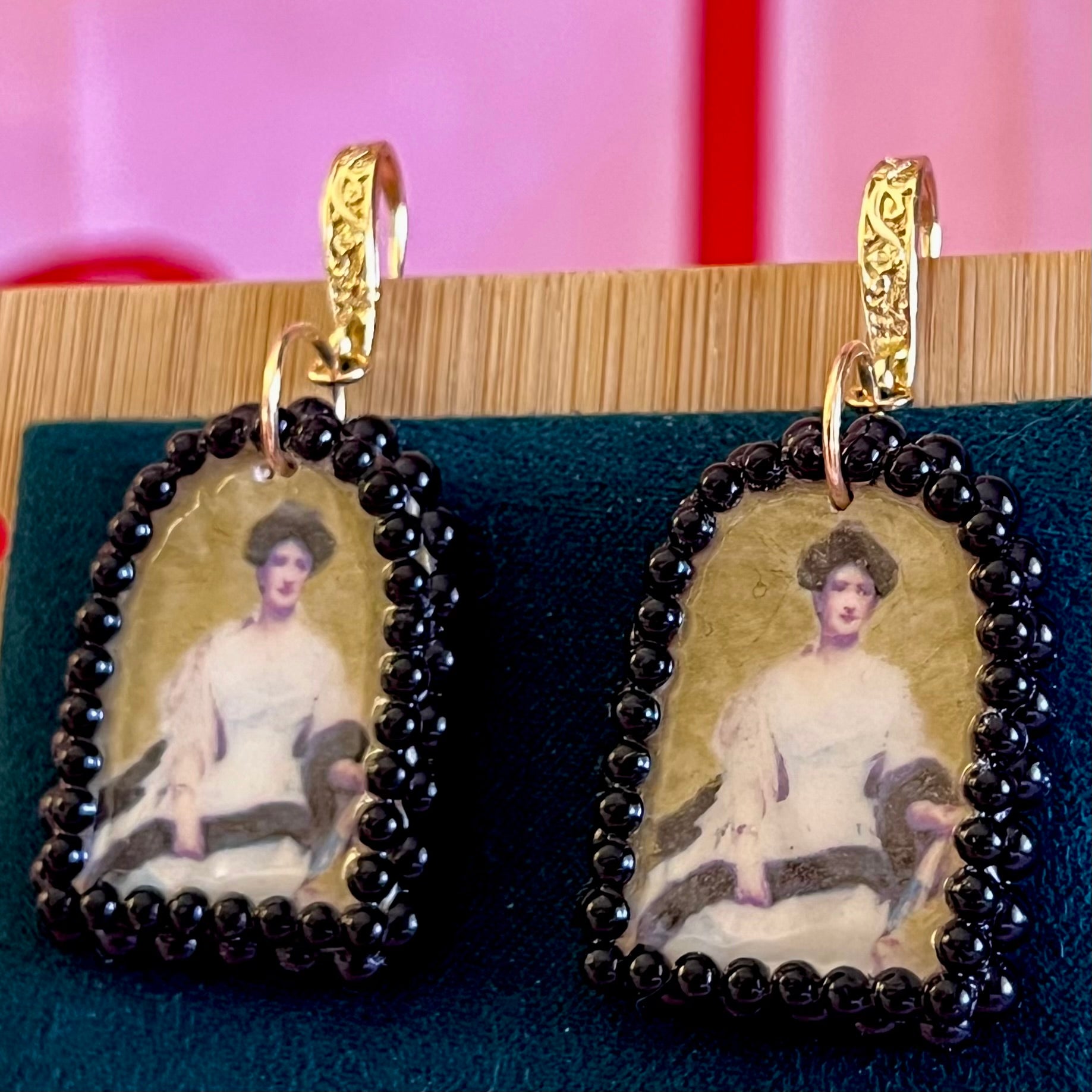 Portrait Of A Lady (1888) by Raimundo de Madrazo y Garreda – large black‑pearl gold arch earrings featuring a polymer‑clay arch charm with a metallic gold background and a transferred portrait image, framed in dark black pearls and finished with ornate 18k gold‑plated Victorian‑inspired filigree; a museum‑style, romantic statement piece.