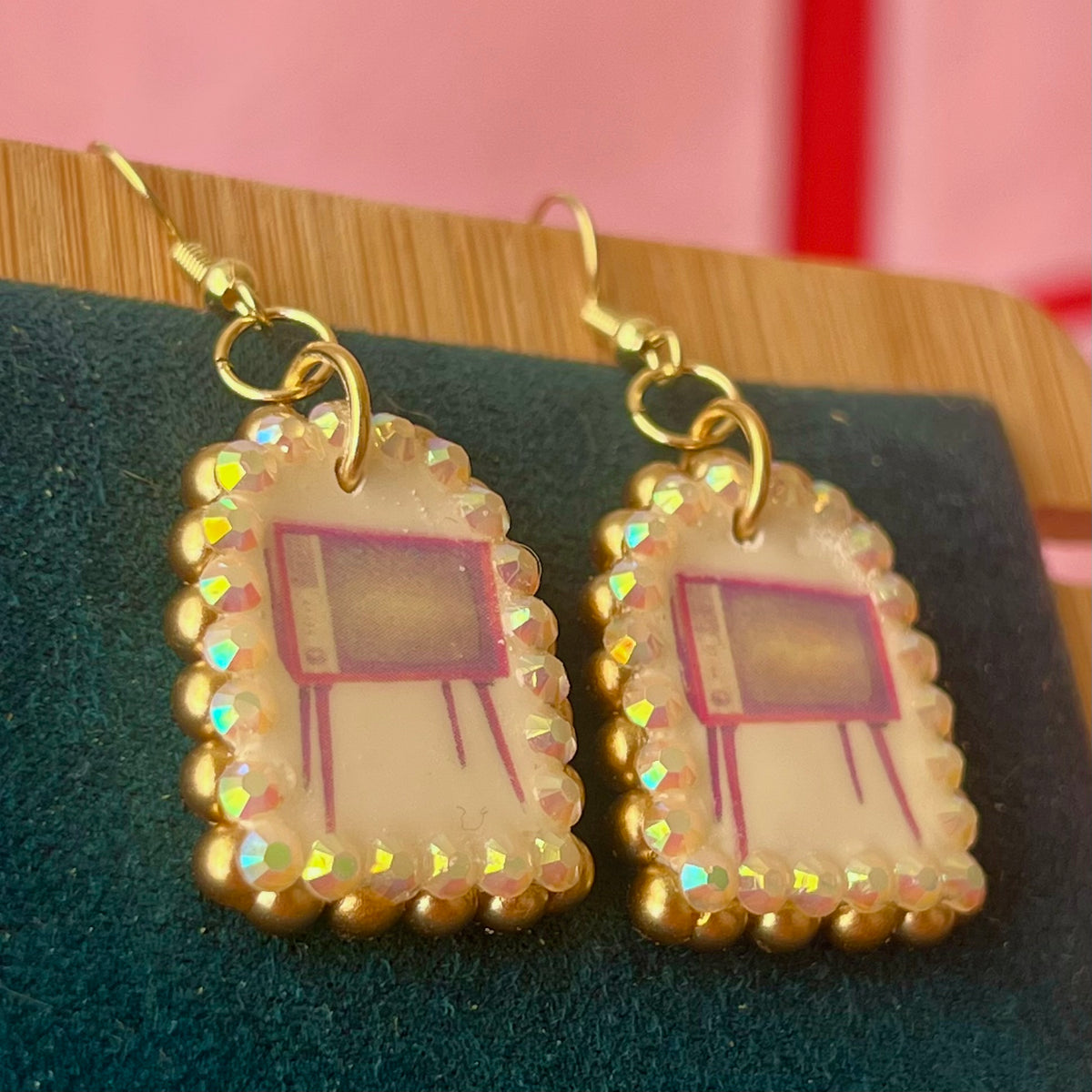 Handmade retro vintage TV charm earrings — pearl‑bedazzled arch dangles with a nostalgic TV graphic, gold/bronze pearl framing and 18k gold‑plated hooks; perfect retro, vintage, Y2K, indie, polymer‑clay statement jewelry.