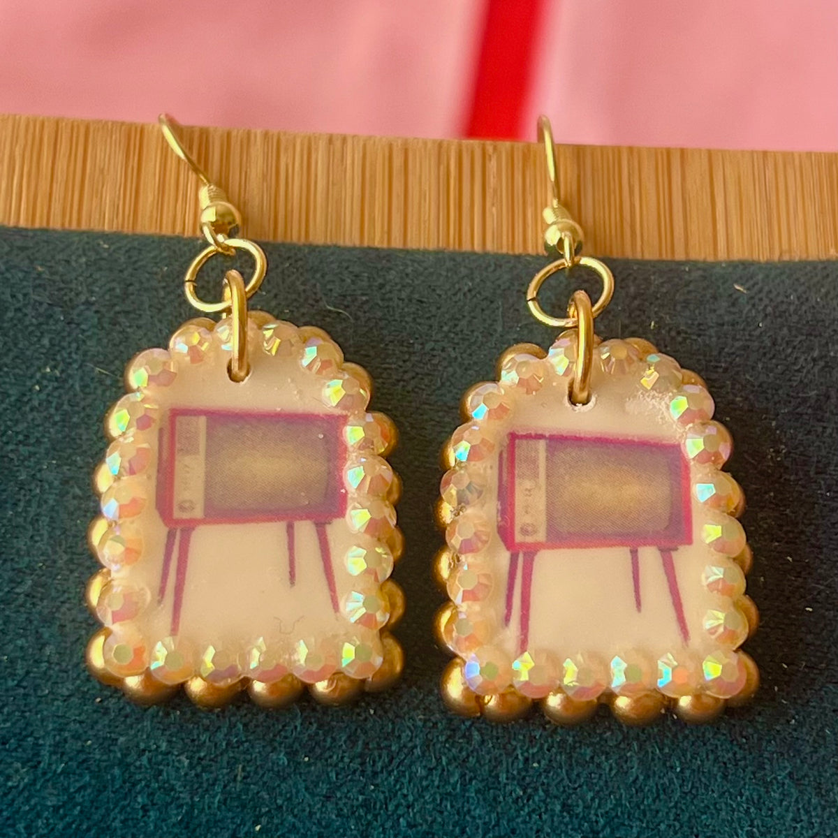 Handmade retro vintage TV charm earrings — pearl‑bedazzled arch dangles with a nostalgic TV graphic, gold/bronze pearl framing and 18k gold‑plated hooks; perfect retro, vintage, Y2K, indie, polymer‑clay statement jewelry.
