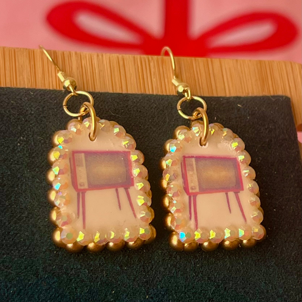 Handmade retro vintage TV charm earrings — pearl‑bedazzled arch dangles with a nostalgic TV graphic, gold/bronze pearl framing and 18k gold‑plated hooks; perfect retro, vintage, Y2K, indie, polymer‑clay statement jewelry.