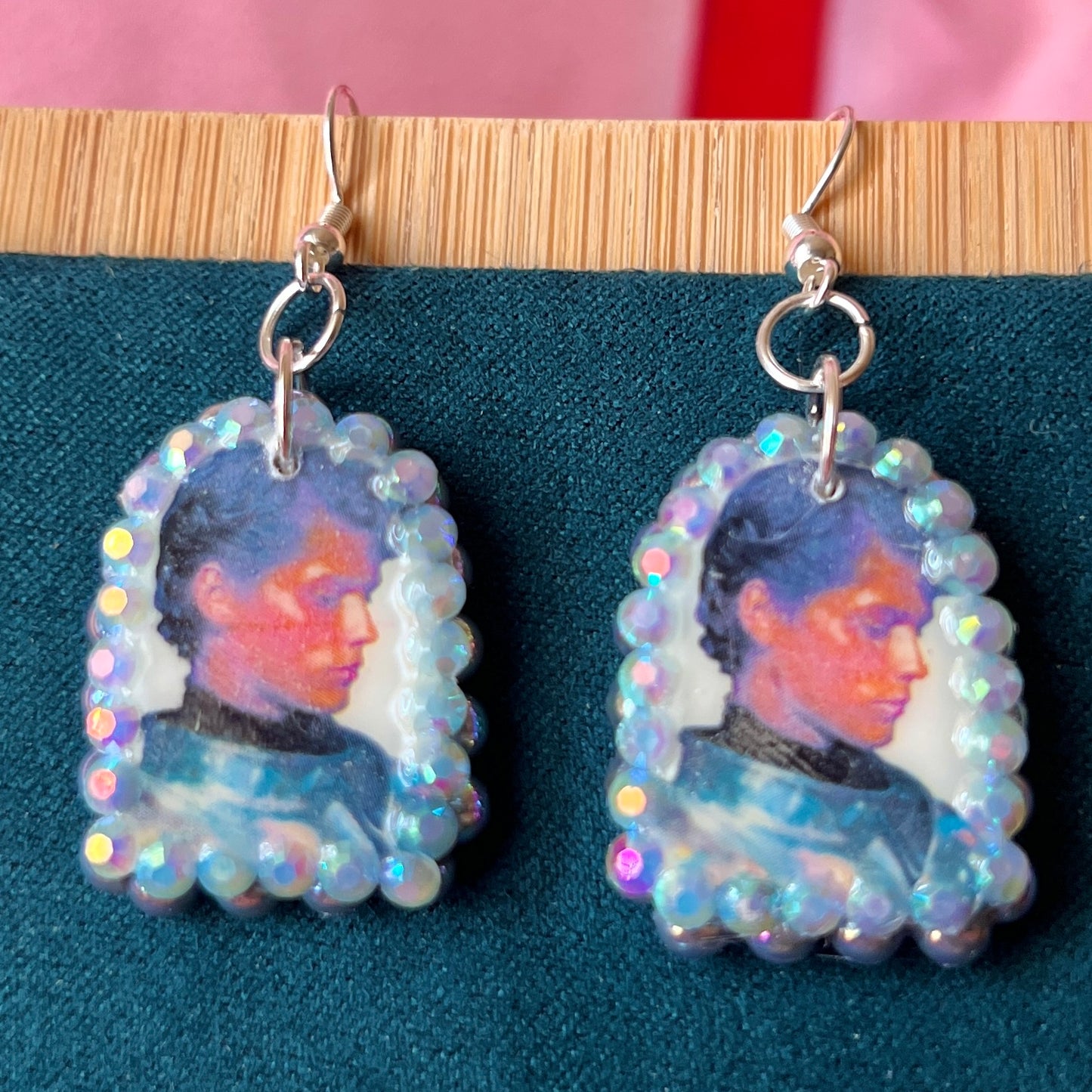 Handmade Shining Knight earrings with medieval knight polymer clay charms framed with iridescent gray pearls and rhinestones on white gold plated hypoallergenic hooks.