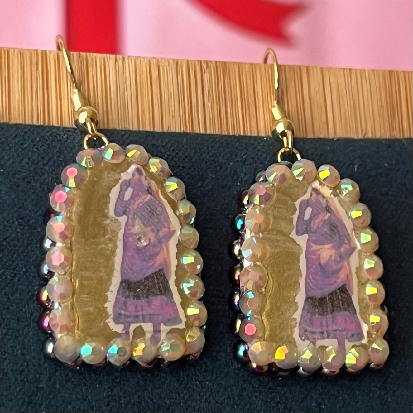Handmade 1" arch earrings featuring a traditional Indian‑style lady portrait with black iridescent pearl frame, polymer clay image‑transfer, 18k gold‑plated hypoallergenic findings—perfect Indian dress, portrait, lady, arch, polymer clay, image transfer, black pearl, iridescent pearl, 18k gold plated, hypoallergenic, handmade, wearable art, renaissance‑inspired jewelry.