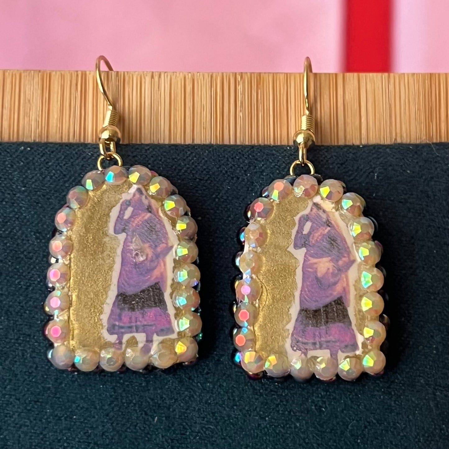 Handmade 1" arch earrings featuring a traditional Indian‑style lady portrait with black iridescent pearl frame, polymer clay image‑transfer, 18k gold‑plated hypoallergenic findings—perfect Indian dress, portrait, lady, arch, polymer clay, image transfer, black pearl, iridescent pearl, 18k gold plated, hypoallergenic, handmade, wearable art, renaissance‑inspired jewelry.