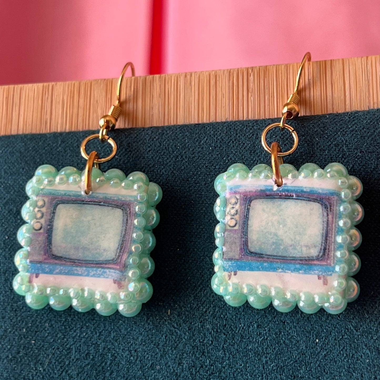 Handmade retro vintage TV charm earrings — pearl‑bedazzled arch dangles with a nostalgic TV graphic, gold/bronze pearl framing and 18k gold‑plated hooks; perfect retro, vintage, Y2K, indie, polymer‑clay statement jewelry.