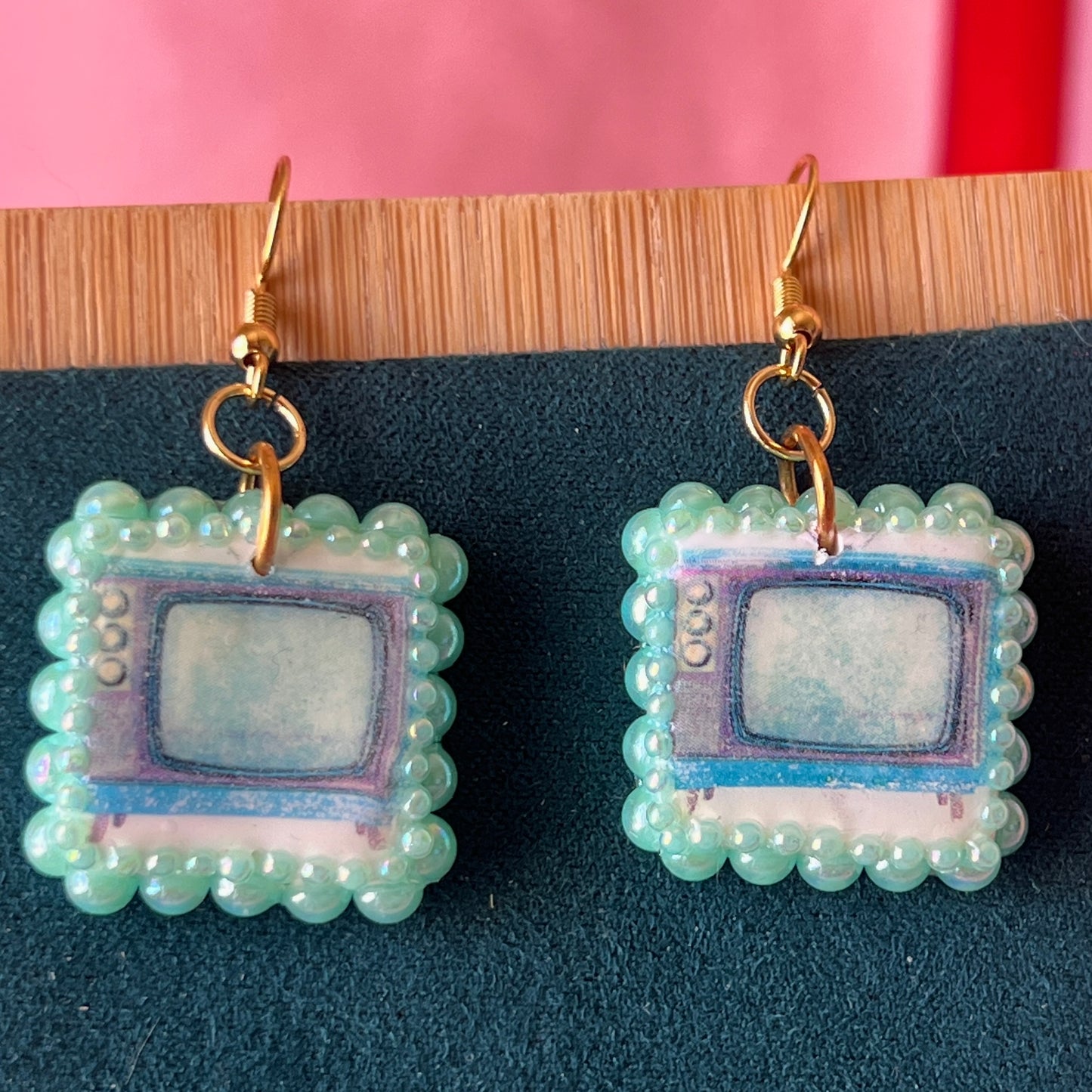 Handmade retro vintage TV charm earrings — pearl‑bedazzled arch dangles with a nostalgic TV graphic, gold/bronze pearl framing and 18k gold‑plated hooks; perfect retro, vintage, Y2K, indie, polymer‑clay statement jewelry.