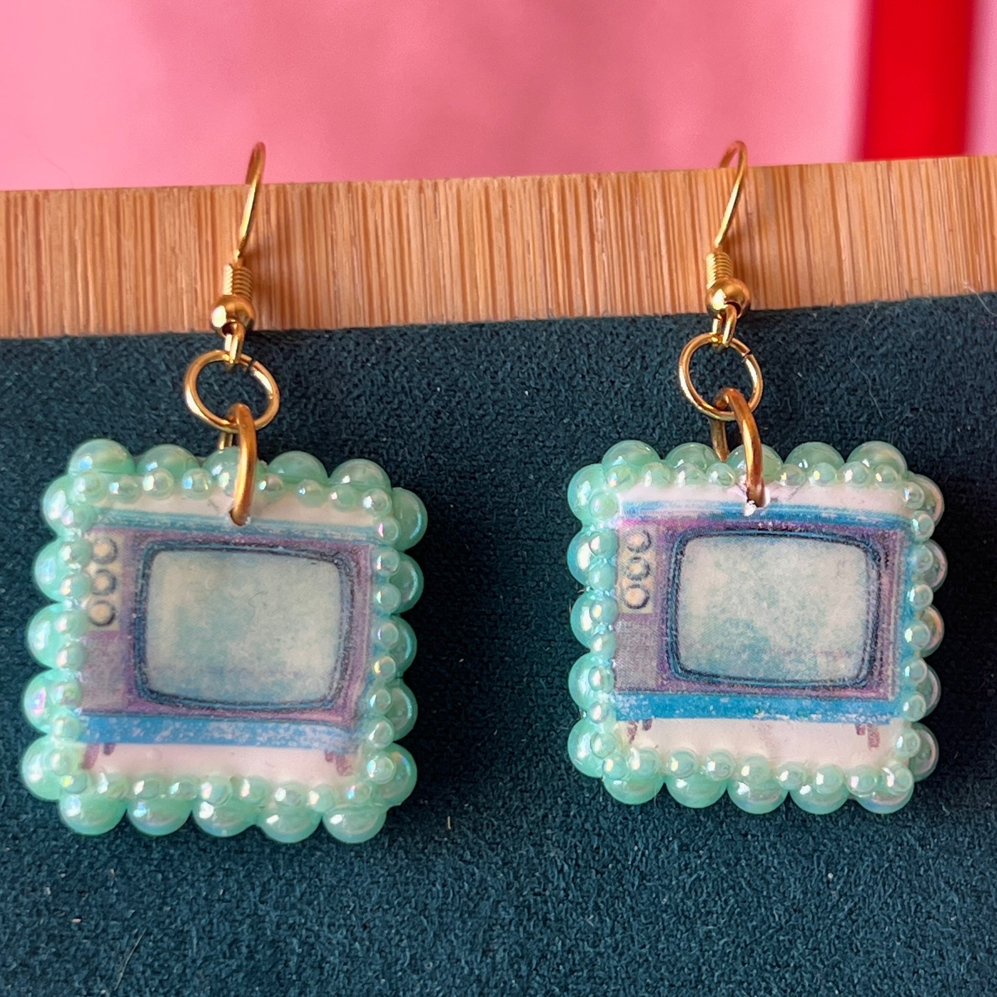 Handmade retro vintage TV charm earrings — pearl‑bedazzled arch dangles with a nostalgic TV graphic, gold/bronze pearl framing and 18k gold‑plated hooks; perfect retro, vintage, Y2K, indie, polymer‑clay statement jewelry.