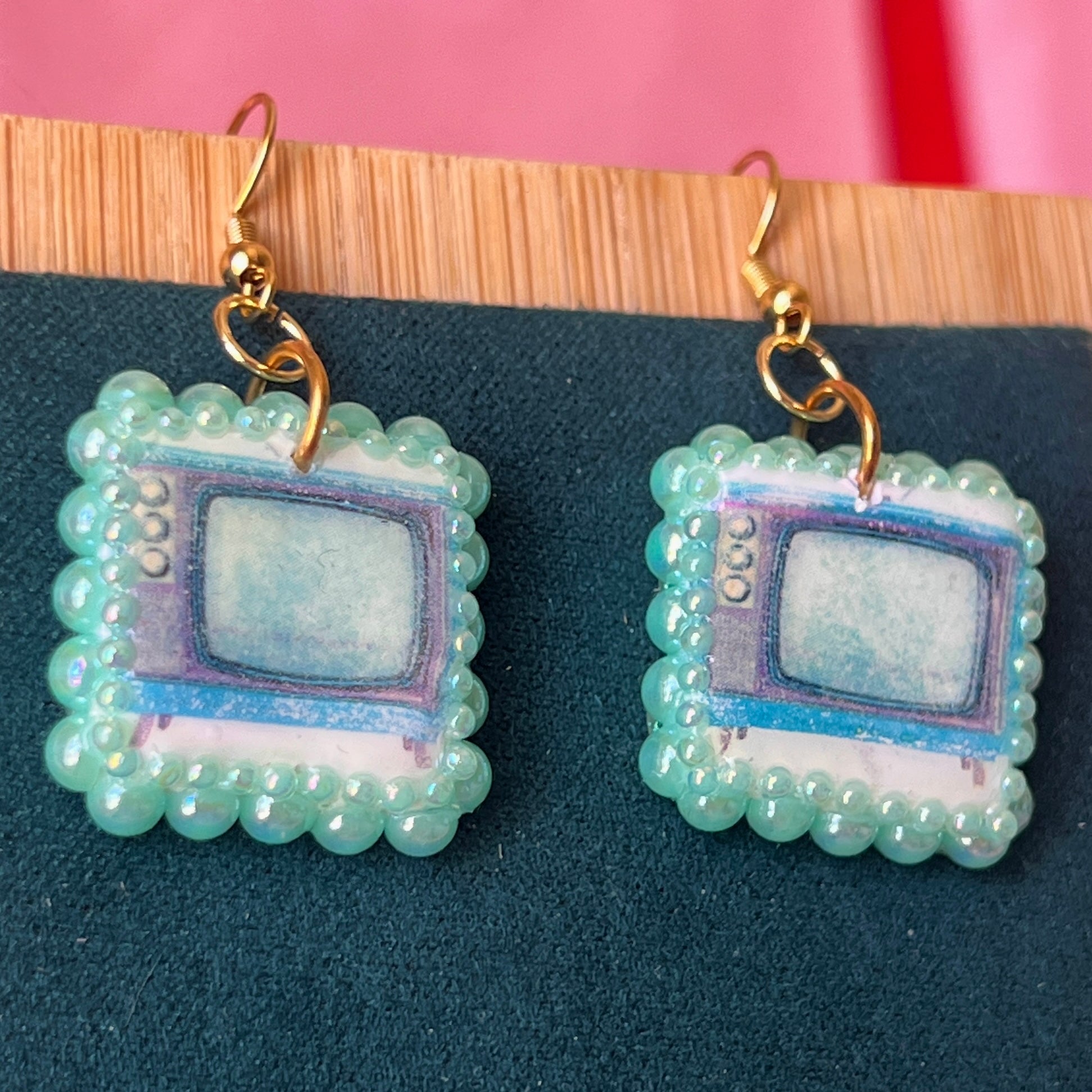 Handmade retro vintage TV charm earrings — pearl‑bedazzled arch dangles with a nostalgic TV graphic, gold/bronze pearl framing and 18k gold‑plated hooks; perfect retro, vintage, Y2K, indie, polymer‑clay statement jewelry.