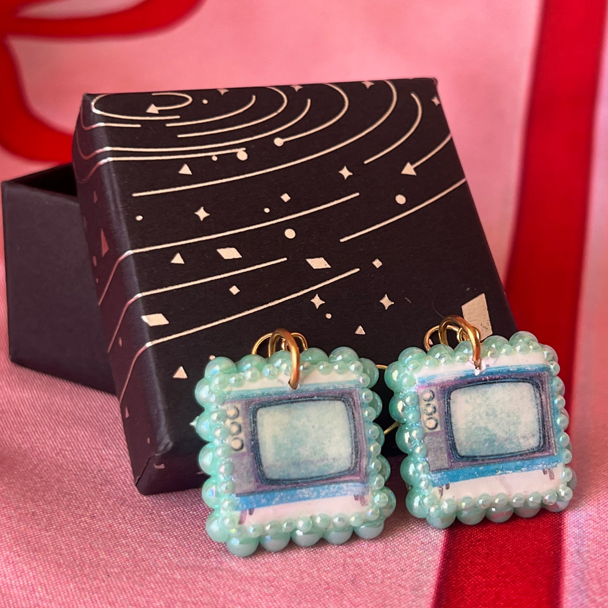 Handmade retro vintage TV charm earrings — pearl‑bedazzled arch dangles with a nostalgic TV graphic, gold/bronze pearl framing and 18k gold‑plated hooks; perfect retro, vintage, Y2K, indie, polymer‑clay statement jewelry.