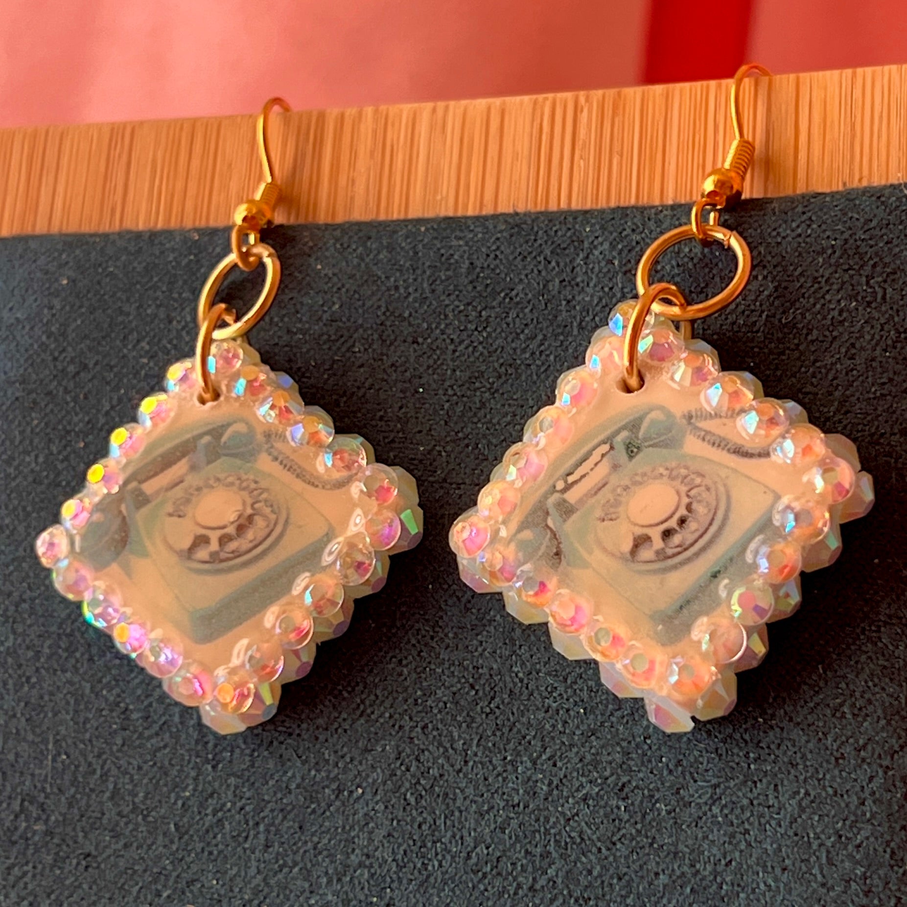 Alt text: "Whimsical Y2K retro landline phone earrings with metallic gold backing, 18k gold‑plated brass hooks, and a playful phone design – perfect statement earrings for Y2K, whimsigoth, and retro aesthetic jewelry."