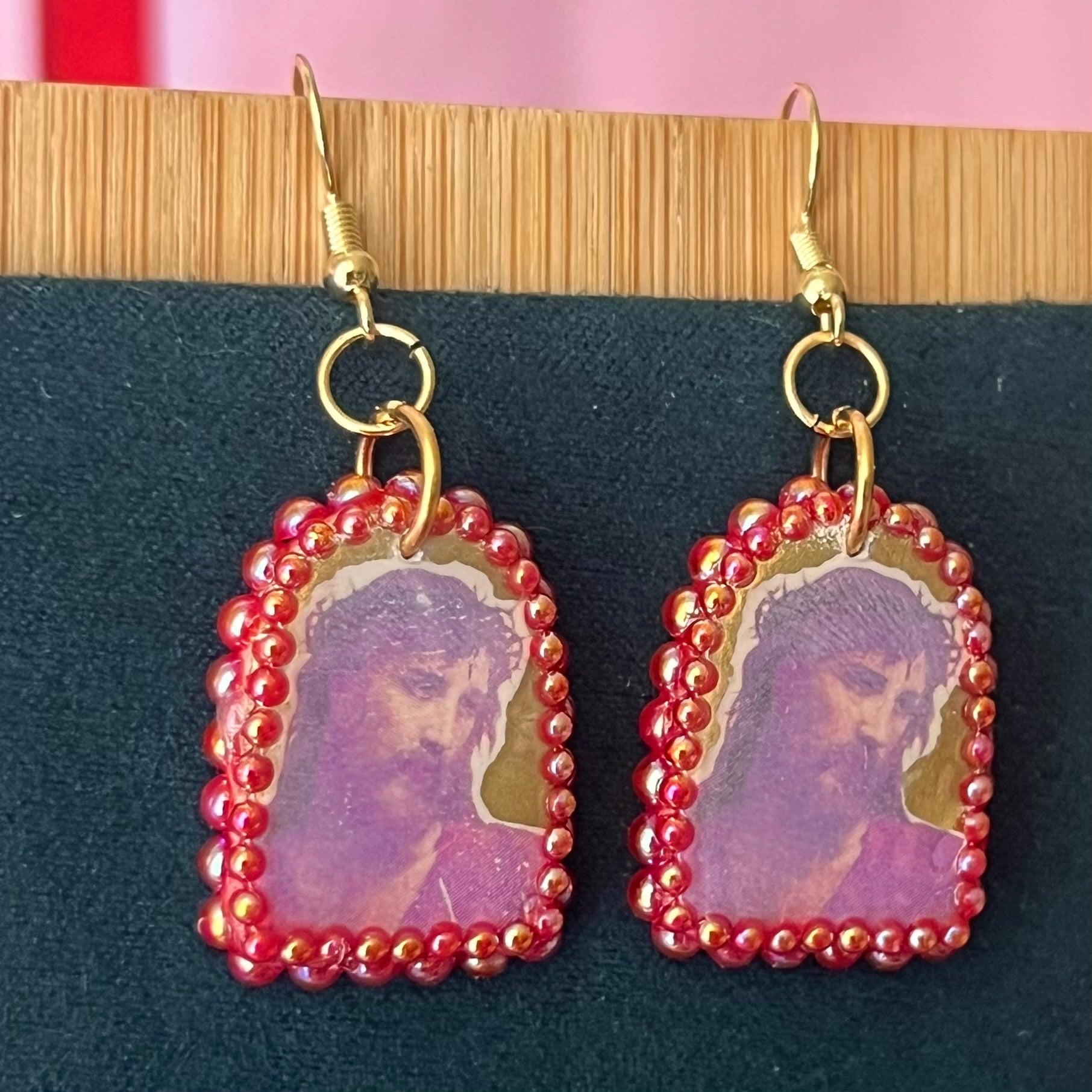 Handmade 1" polymer‑clay Yeshua (Jesus) earrings with gold aura background, iridescent pearl frame, and 18k gold‑plated findings – yeshua earrings, jesus earrings, religious art earrings, christian jewelry, sacred art jewelry, gold aura earrings, arch earrings, polymer clay earrings, image transfer earrings, pearl frame earrings, iridescent pearl earrings, 18k gold plated earrings, handmade earrings, wearable art earrings.