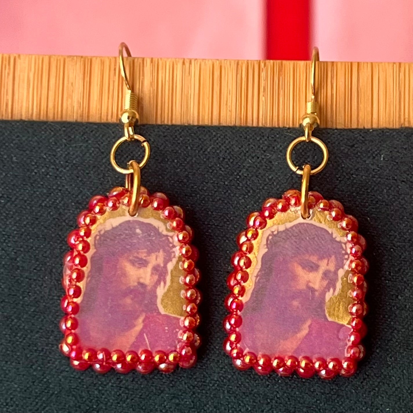 Handmade 1" polymer‑clay Yeshua (Jesus) earrings with gold aura background, iridescent pearl frame, and 18k gold‑plated findings – yeshua earrings, jesus earrings, religious art earrings, christian jewelry, sacred art jewelry, gold aura earrings, arch earrings, polymer clay earrings, image transfer earrings, pearl frame earrings, iridescent pearl earrings, 18k gold plated earrings, handmade earrings, wearable art earrings.