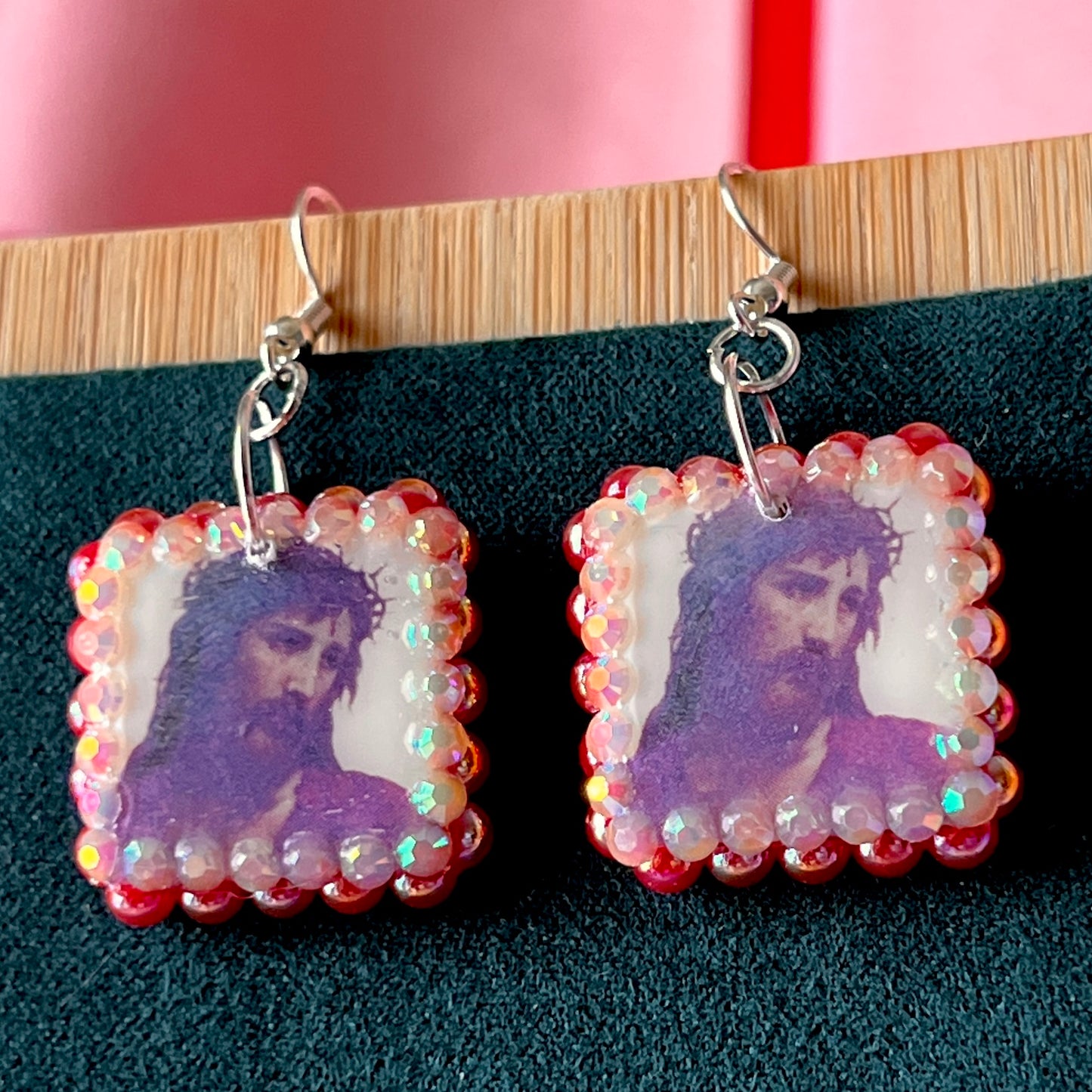 Renaissance-inspired Yeshua (Jesus) oil painting earrings handcrafted from polymer clay, adorned with iridescent pearls and rhinestones, featuring silver‑plated hypoallergenic hooks—perfect wearable art for art lovers, collectors, and those seeking meaningful, statement jewelry.
