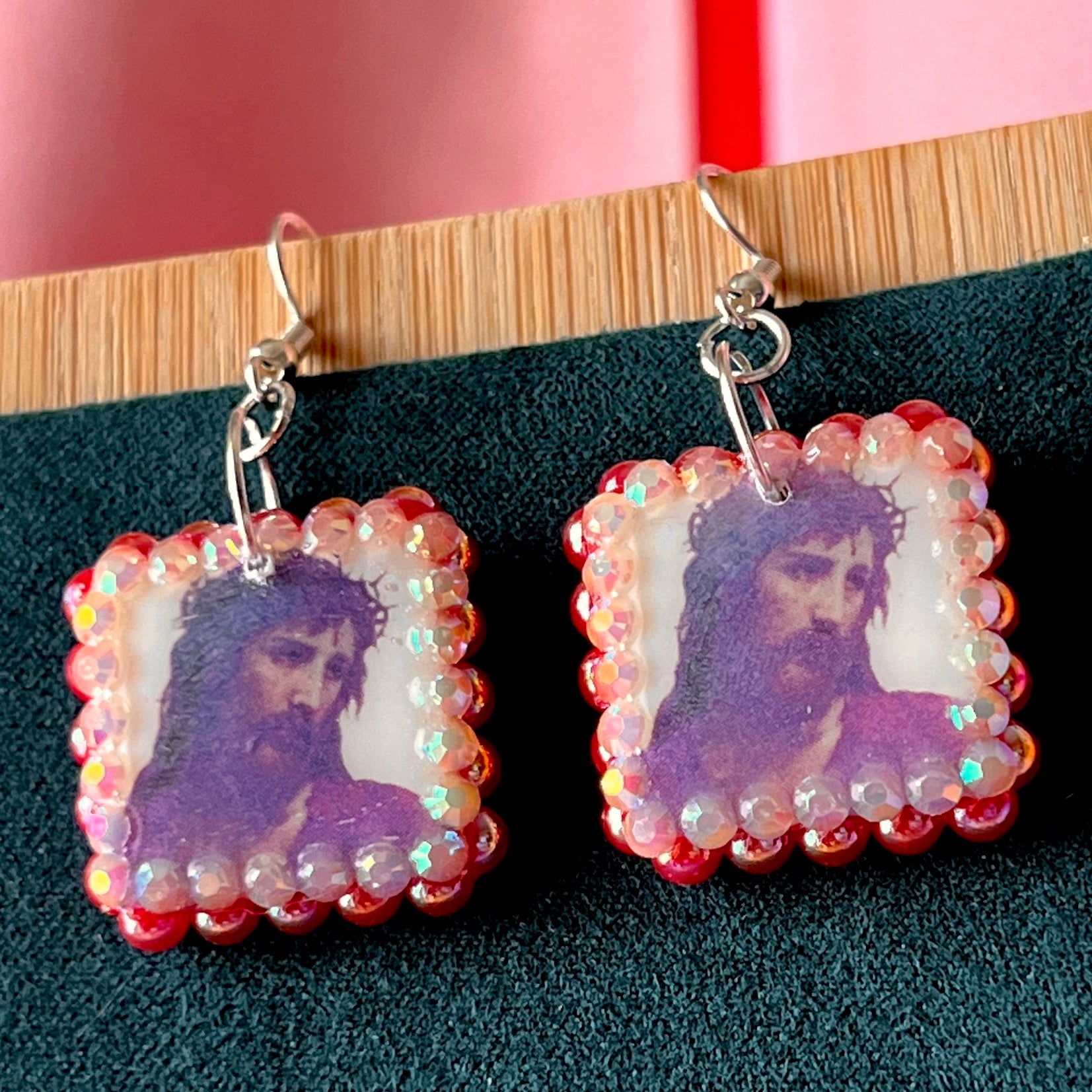 Renaissance-inspired Yeshua (Jesus) oil painting earrings handcrafted from polymer clay, adorned with iridescent pearls and rhinestones, featuring silver‑plated hypoallergenic hooks—perfect wearable art for art lovers, collectors, and those seeking meaningful, statement jewelry.