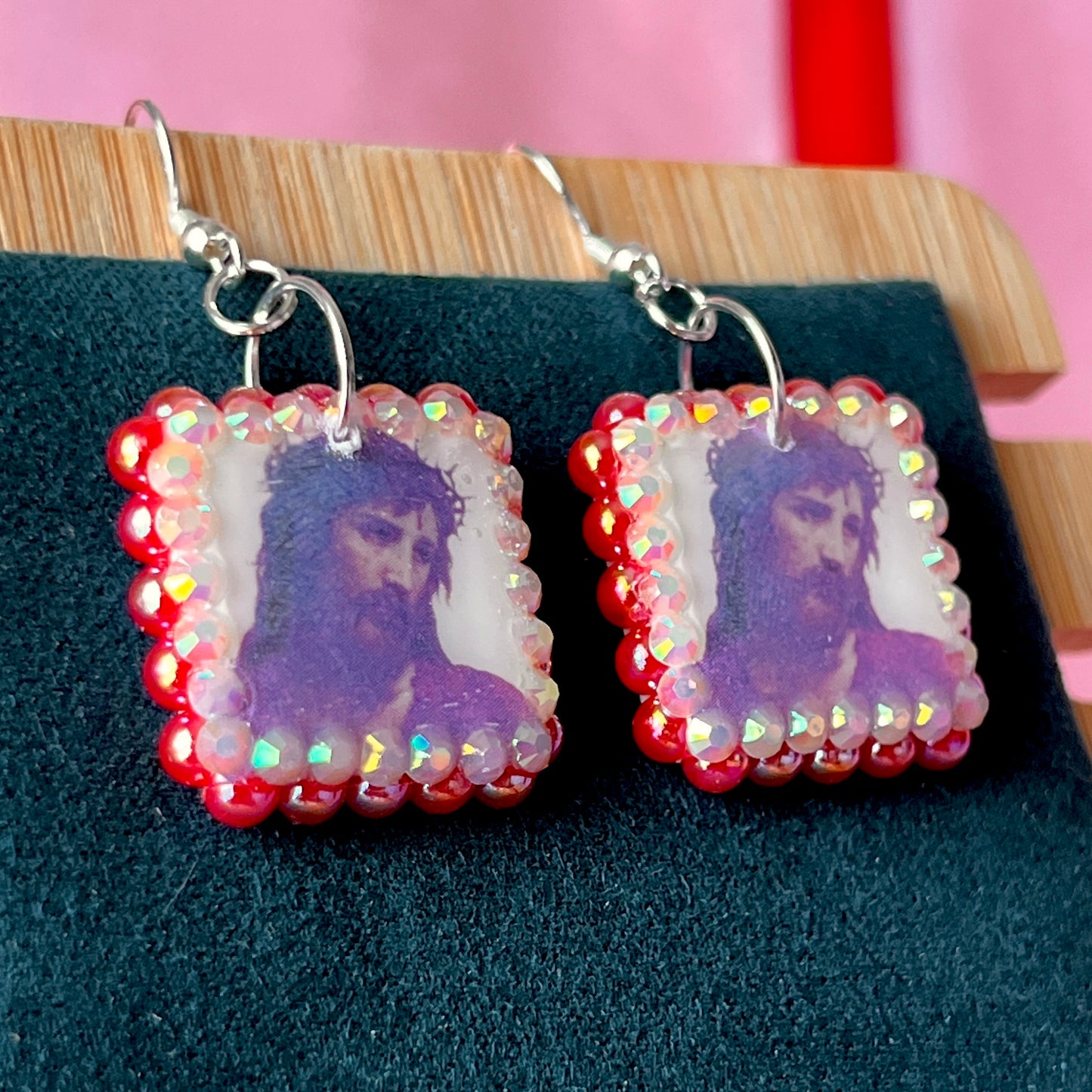 Renaissance-inspired Yeshua (Jesus) oil painting earrings handcrafted from polymer clay, adorned with iridescent pearls and rhinestones, featuring silver‑plated hypoallergenic hooks—perfect wearable art for art lovers, collectors, and those seeking meaningful, statement jewelry.