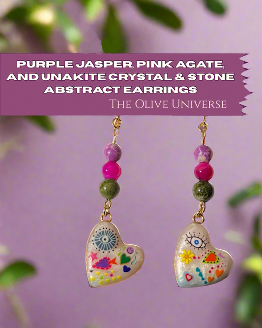 Heart-shaped abstract earrings with colorful beads against a mystical forest background.