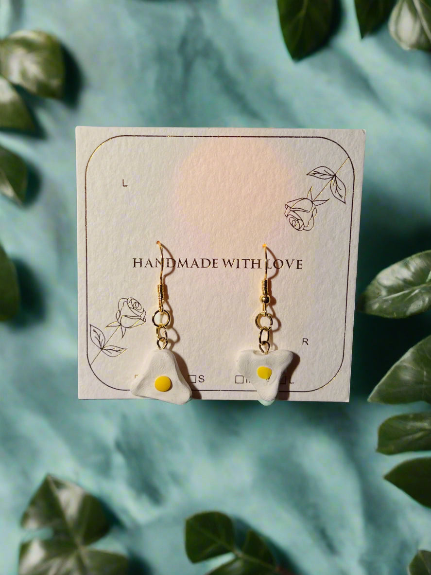 Pair of earrings on a card with 'Handmade with Love' text