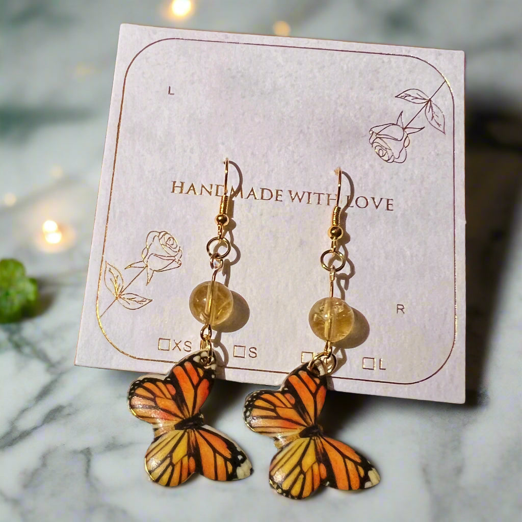 Butterfly earrings on a card with 'Handmade with Love' text
