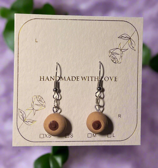 Pair of wooden earrings on a 'Handmade with Love' card.