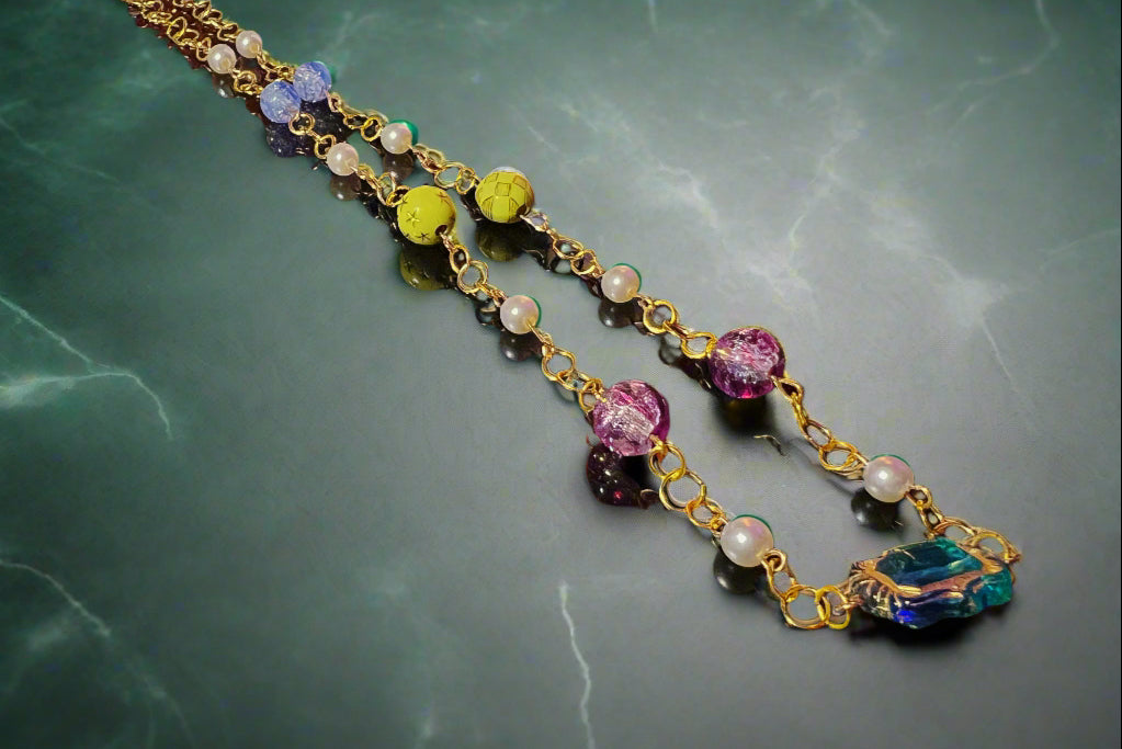 Necklace with colorful beads on a dark surface