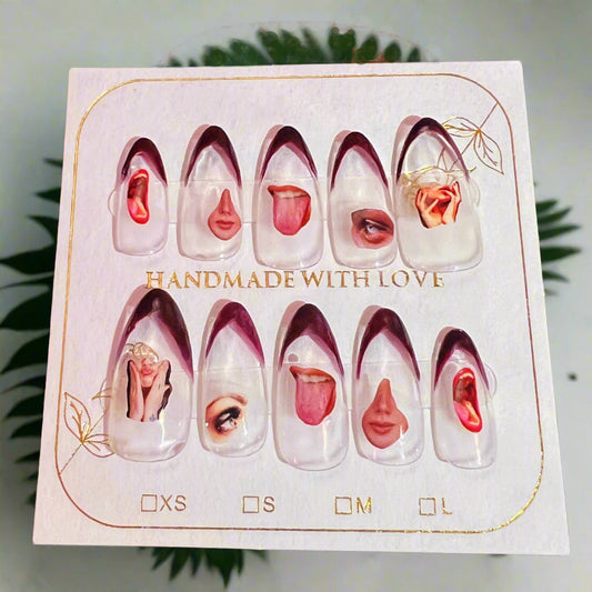 Card with nail art designs of faces and lips, labeled 'Handmade with Love'.