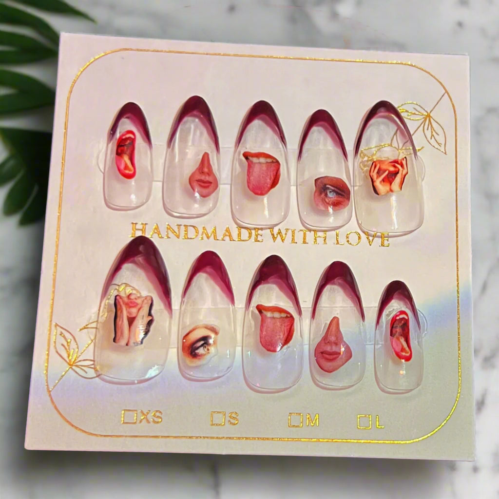 Set of handmade nail art designs on a display card with 'Handmade with Love' text.